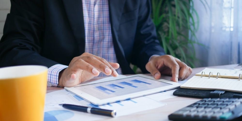 Man working on finance calculations