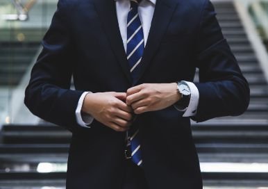 Man in navy suit