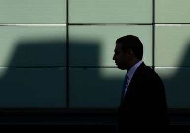 Man in a business suit walking