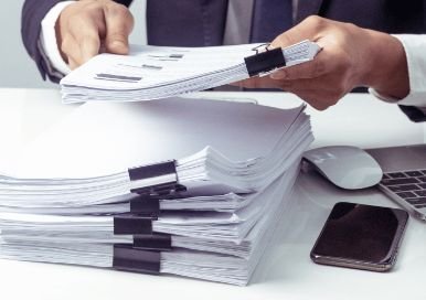 Man signing documents