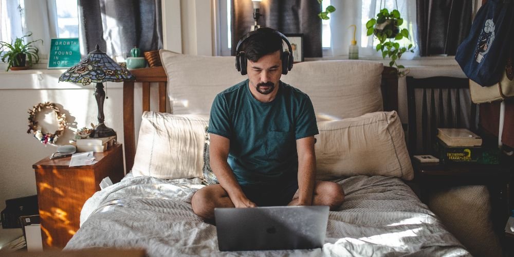 man working from the comfort of his home