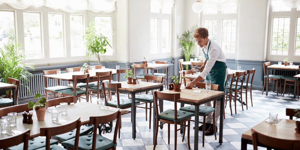 restaurant space being tidied up